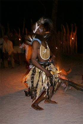 'San, or Bushman, performing a dance at Camp Jao in Botswana', 2007,  Justin Hall